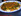 Lamm-Tagine mit Zucchini, Kartoffeln und sonnengetroc ...